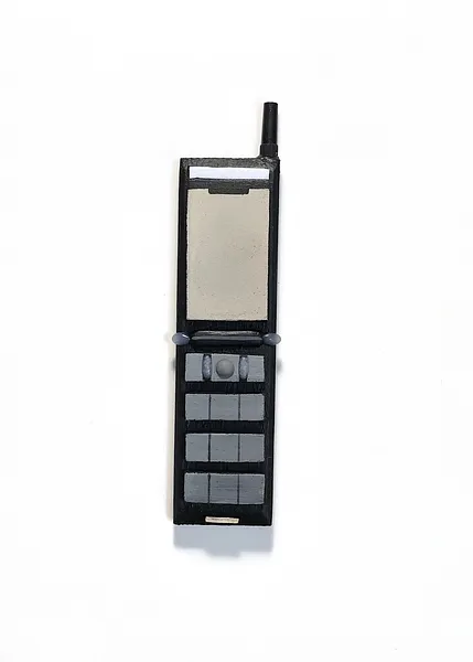 Image of Phones by Adriana Shportan, size: The average size of one phone 10 cm × 5 cm × 1.5 cm, made of wooden blocks, acrylic paint, and found/recycled materials;, Installation medium, from London, part of the “When It Is Our Turn to Be Adults” series Photo 3 of 17.
