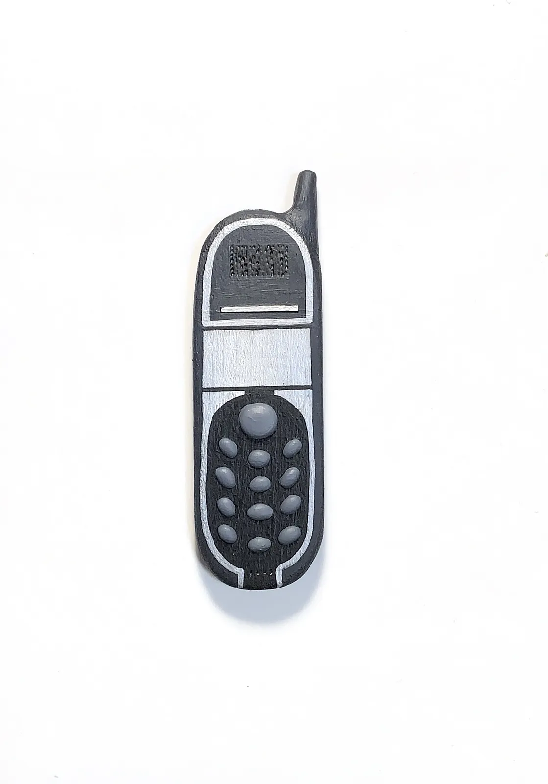 Image of Phones by Adriana Shportan, size: The average size of one phone 10 cm × 5 cm × 1.5 cm, made of wooden blocks, acrylic paint, and found/recycled materials;, Installation medium, from London, part of the “When It Is Our Turn to Be Adults” series Photo 4 of 17.