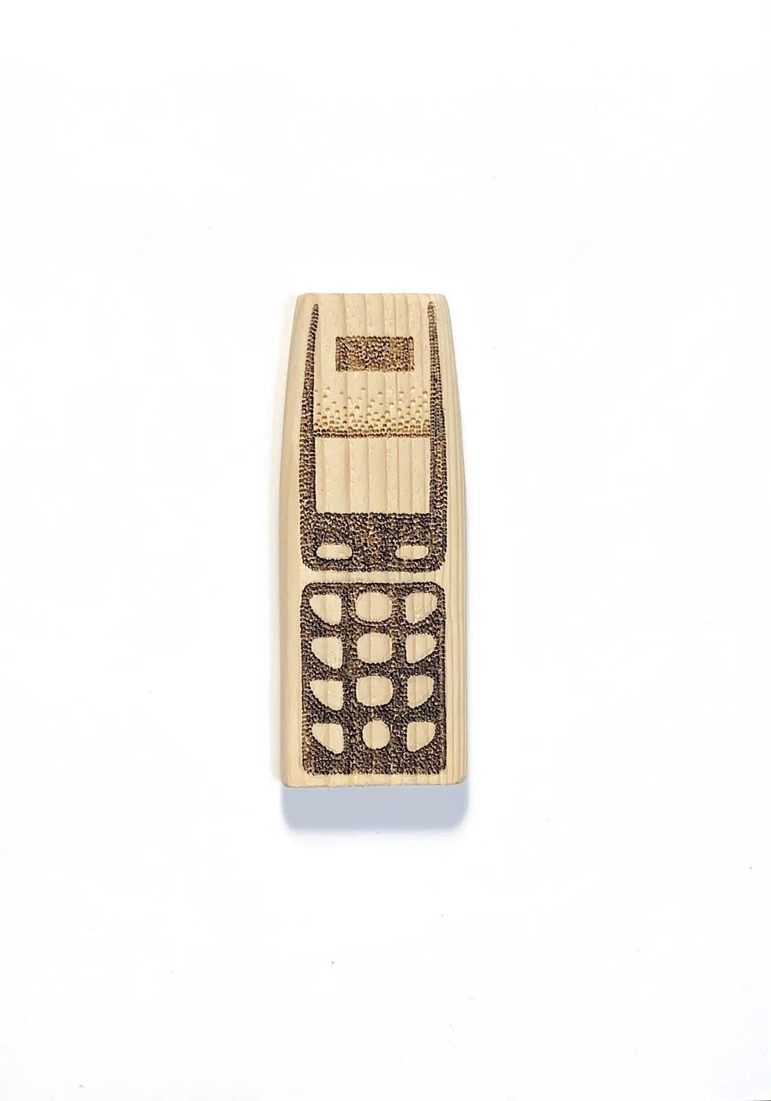 Image of Phones by Adriana Shportan, size: The average size of one phone 10 cm × 5 cm × 1.5 cm, made of wooden blocks, acrylic paint, and found/recycled materials;, Installation medium, from London, part of the “When It Is Our Turn to Be Adults” series Photo 8 of 17.