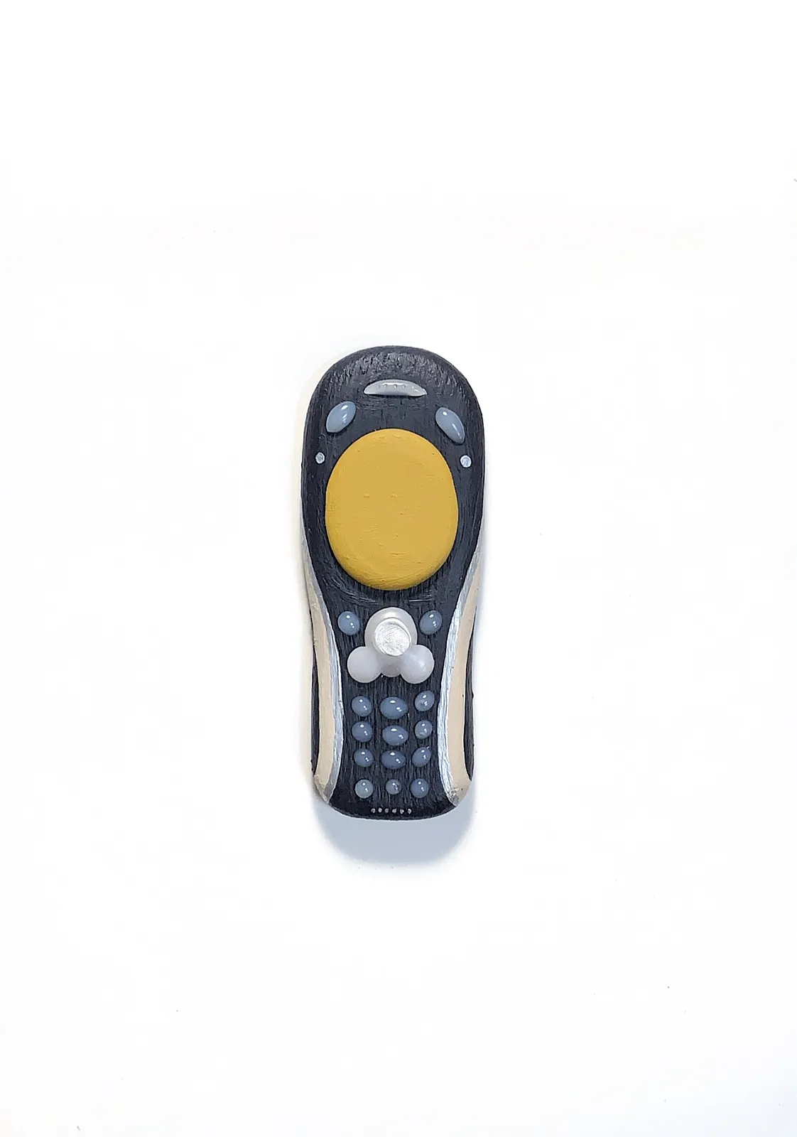 Image of Phones by Adriana Shportan, size: The average size of one phone 10 cm × 5 cm × 1.5 cm, made of wooden blocks, acrylic paint, and found/recycled materials;, Installation medium, from London, part of the “When It Is Our Turn to Be Adults” series Photo 10 of 17.