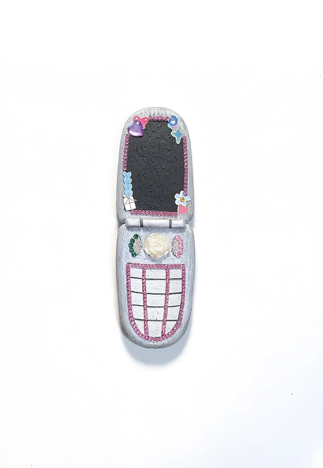Image of Phones by Adriana Shportan, size: The average size of one phone 10 cm × 5 cm × 1.5 cm, made of wooden blocks, acrylic paint, and found/recycled materials;, Installation medium, from London, part of the “When It Is Our Turn to Be Adults” series Photo 11 of 17.