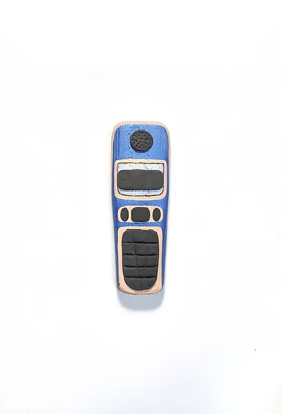 Image of Phones by Adriana Shportan, size: The average size of one phone 10 cm × 5 cm × 1.5 cm, made of wooden blocks, acrylic paint, and found/recycled materials;, Installation medium, from London, part of the “When It Is Our Turn to Be Adults” series Photo 12 of 17.